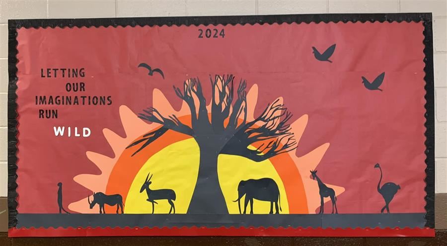  A bulletin board; text that reads "2024 Letting Our Imaginations Run Wild." Animals on a Savannah.